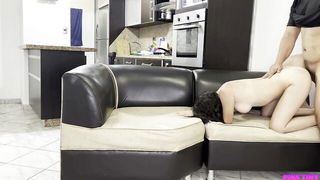 Explicit doggy style scene on a wide bed