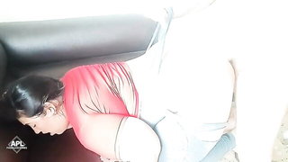 Couple mid-scene in a dim bedroom