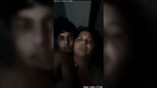 Explicit doggy style scene on a wide bed