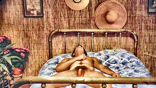Solo performer with a toy on rumpled bedsheets