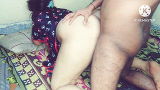 Explicit massage scene in a softly lit room