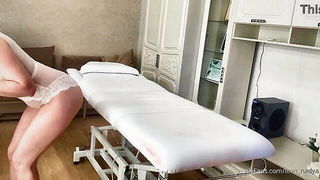 Couple on a made bed in an explicit scene