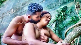 Amateur couple on a living room sofa in explicit scene