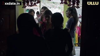 Couple mid-scene in a dim bedroom