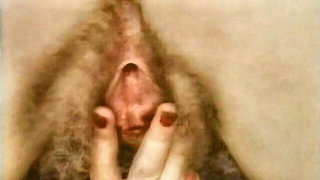 Explicit doggy style scene on a wide bed