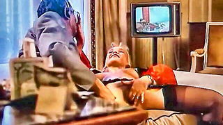 Couple mid-scene in a dim bedroom