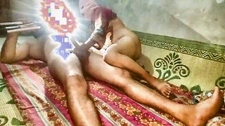 Couple on a made bed in an explicit scene
