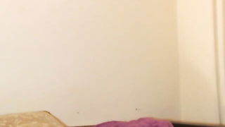 Pair of performers in motion on a wide bed