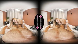 Explicit massage scene in a softly lit room
