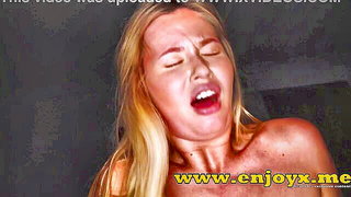 Close frame of an explicit scene in sharp indoor light