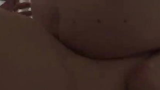 Explicit doggy style scene on a wide bed
