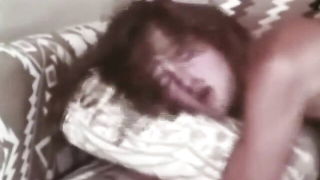 Explicit doggy style scene on a wide bed