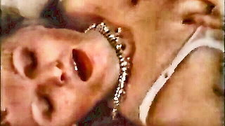 Explicit doggy style scene on a wide bed
