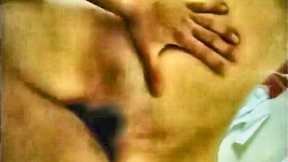 Close frame of an explicit scene in sharp indoor light