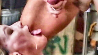 Explicit massage scene in a softly lit room