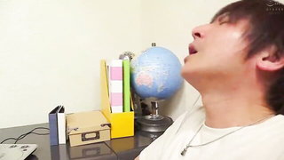 Explicit massage scene in a softly lit room