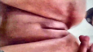 Close frame of an explicit scene in sharp indoor light