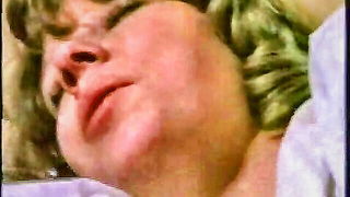 Explicit doggy style scene on a wide bed