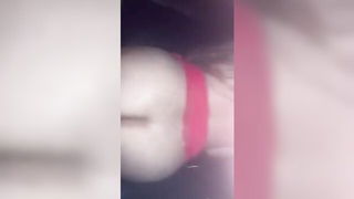 Explicit massage scene in a softly lit room
