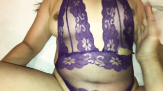 Explicit massage scene in a softly lit room