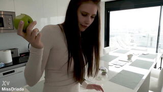 Solo performer with a toy on rumpled bedsheets