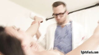 Explicit massage scene in a softly lit room