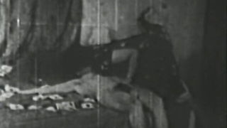 Pair of performers in motion on a wide bed
