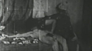 Pair of performers in motion on a wide bed