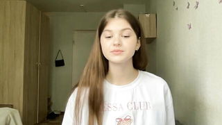 Couple mid-scene in a dim bedroom