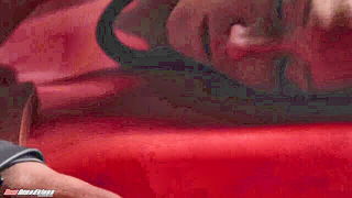 Explicit doggy style scene on a wide bed