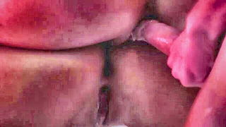 Explicit doggy style scene on a wide bed