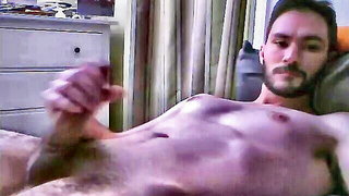 Explicit doggy style scene on a wide bed