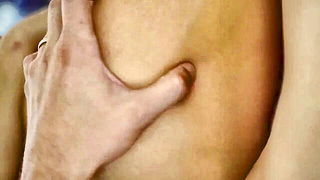 Close frame of an explicit scene in sharp indoor light
