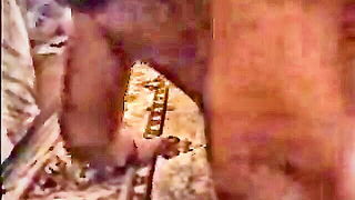 Close frame of an explicit scene in sharp indoor light