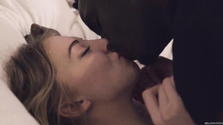 Explicit doggy style scene on a wide bed