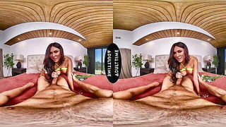 Amateur couple on a living room sofa in explicit scene