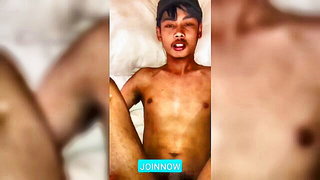 Solo performer with a toy on rumpled bedsheets