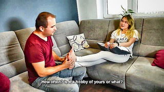 Explicit massage scene in a softly lit room