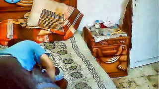 Solo performer with a toy on rumpled bedsheets