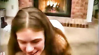 Couple mid-scene in a dim bedroom