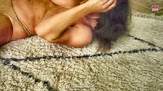 Explicit doggy style scene on a wide bed
