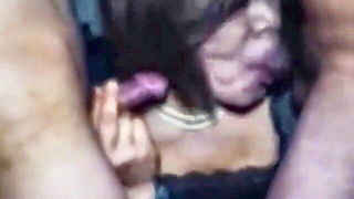 Solo performer with a toy on rumpled bedsheets