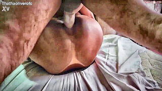 Solo performer with a toy on rumpled bedsheets