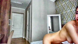 Explicit doggy style scene on a wide bed