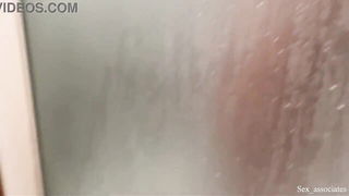 Explicit doggy style scene on a wide bed