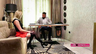 Couple mid-scene in a dim bedroom