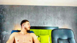 Explicit doggy style scene on a wide bed