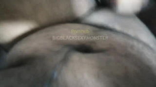 Explicit doggy style scene on a wide bed