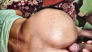 Explicit doggy style scene on a wide bed