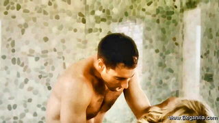 Explicit massage scene in a softly lit room